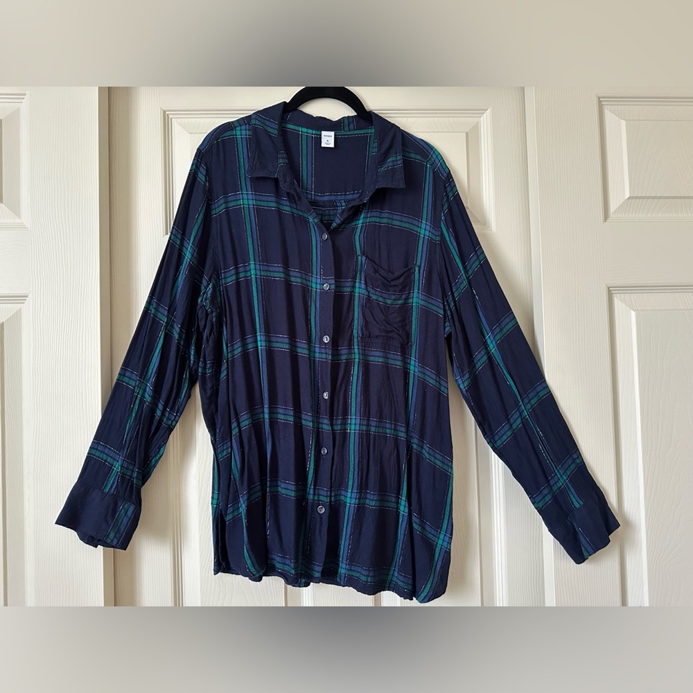 Thin fleece button down top. Blue, green with a hint of shimmer.
